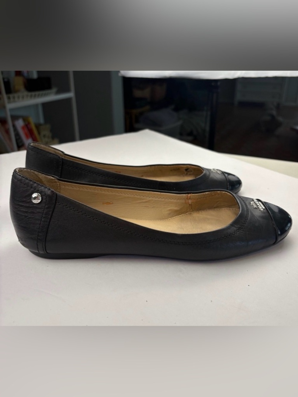 Coach Black Leather Women's Flats with Silver Accents